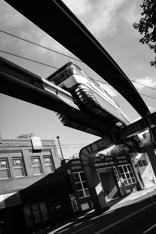 A monorail going over 5th Avenue in Seattle.