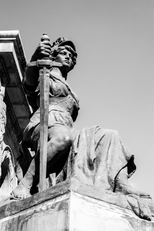 One of the statues at the Angel of Independence in Mexico City.