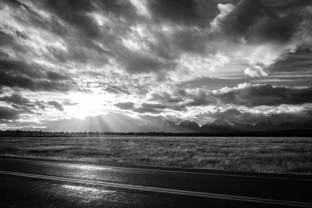 The landscape near the Elk Ranch, with the Teton range in the background, at sunset.