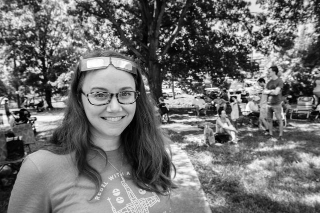 Kate, wearing solar eclipse glasses in Etowah.