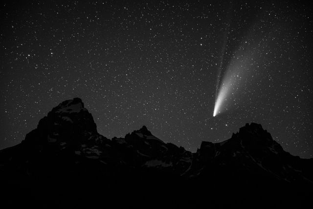 Comet NEOWISE setting behind Teewinot Mountain in Grand Teton National Park.