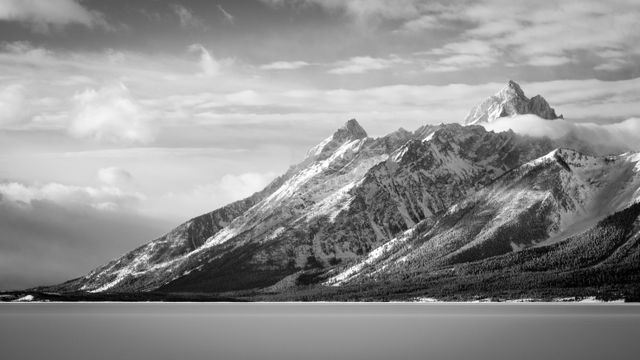 The Teton Range, seen early on a cloudy winter morning from the Jackson Lake Overlook.