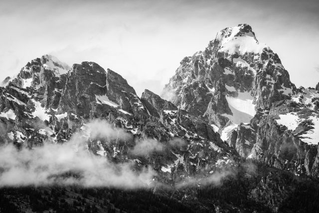 Nez Perce Peak and Grand Teton emerging from the clouds after a storm.