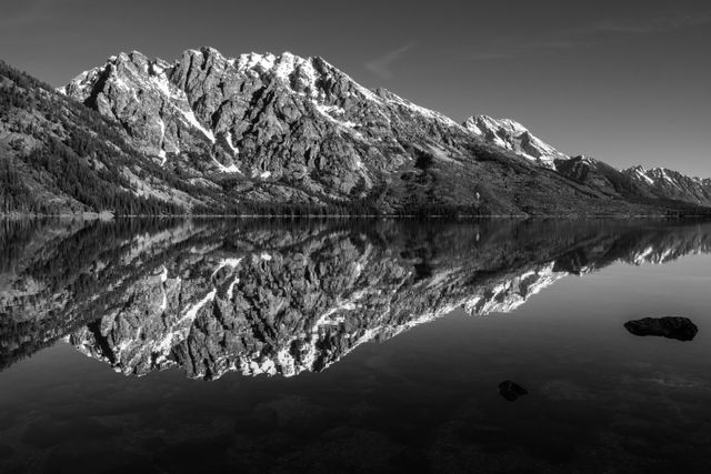 Symmetry Spire, Mount Saint John, and Rockchuck Peak, reflected off of Jenny Lake.