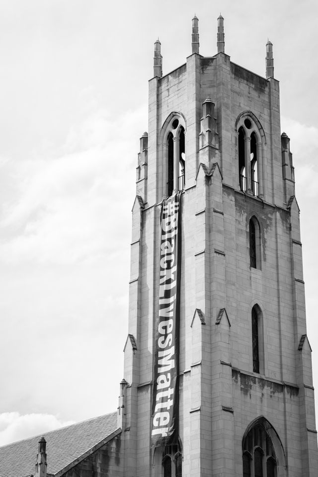 The Church of the Pilgrims in Washington, DC, featuring a large banner with the hashtag #BlackLivesMatter.