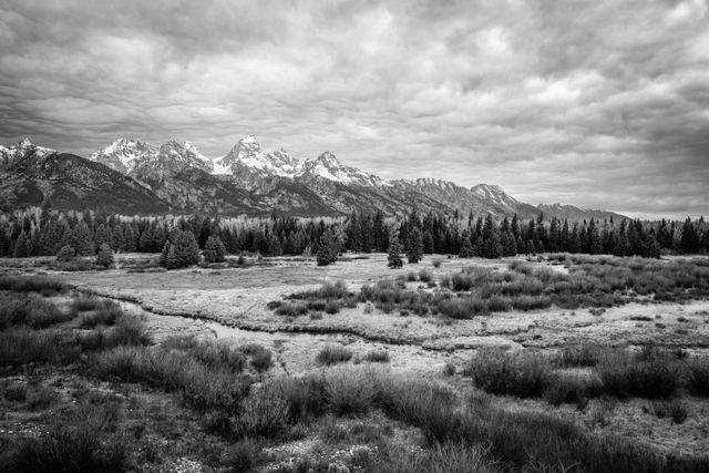 The Teton range, seen from the Blacktail Ponds overlook, under dramatic storm clouds.