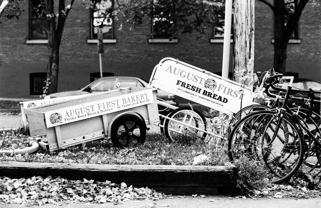 Carts and bikes outside the August First Bakery, Burlington, VT.