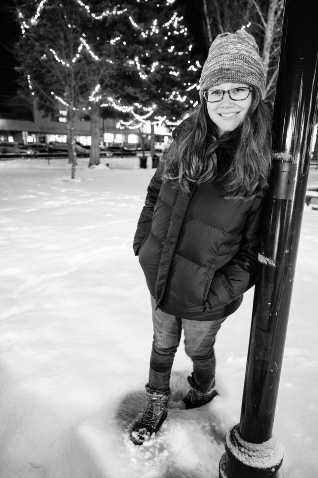 Kate posing in the snow in Jackson's Town Square.