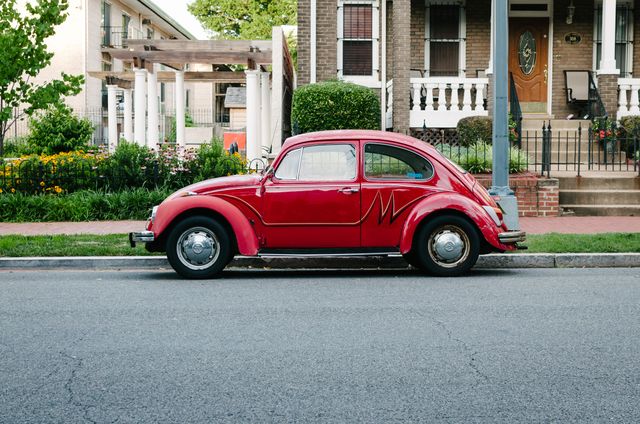 A red Volkswagen Beetle in Capitol Hill, Washington, DC.