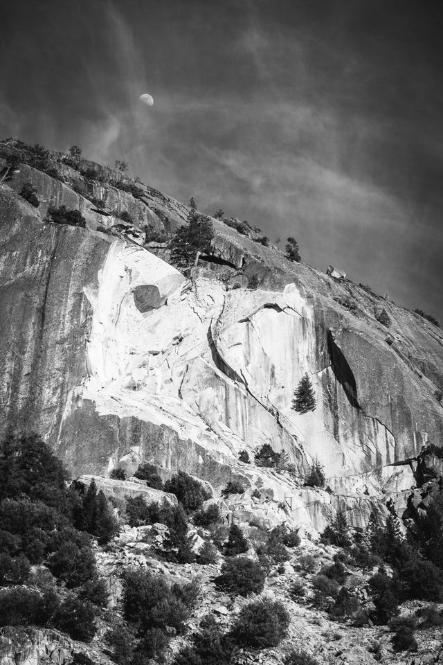 The moon over a cliff at Yosemite.