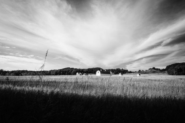 The DH Day Farm at Sleeping Bear Dunes National Lakeshore, under a sky streaked with clouds.