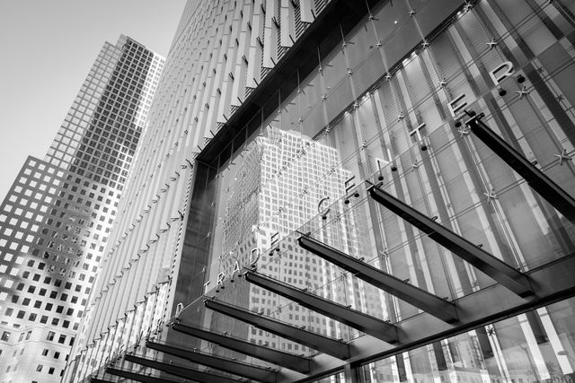 The "One World Trade Center" sign at the entrance to the building.