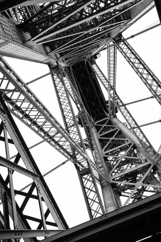 Looking up at one of the towers of the Williamsburg Bridge in New York.