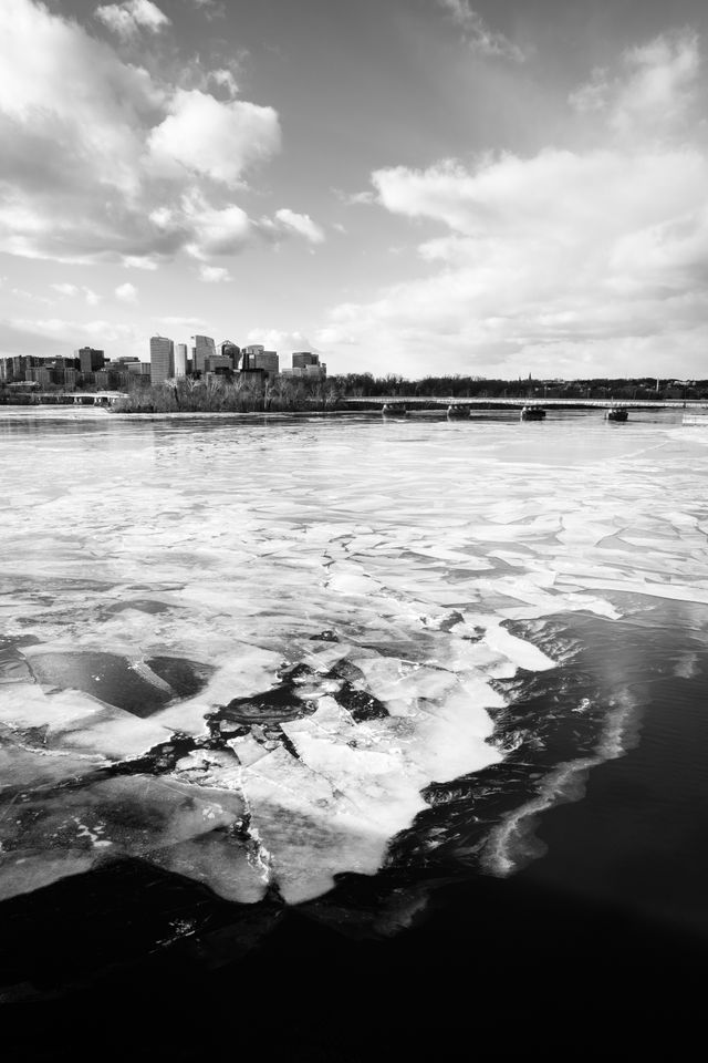 The Rosslyn skyline, in front of a frozen Potomac River, from the Arlington Memorial Bridge.