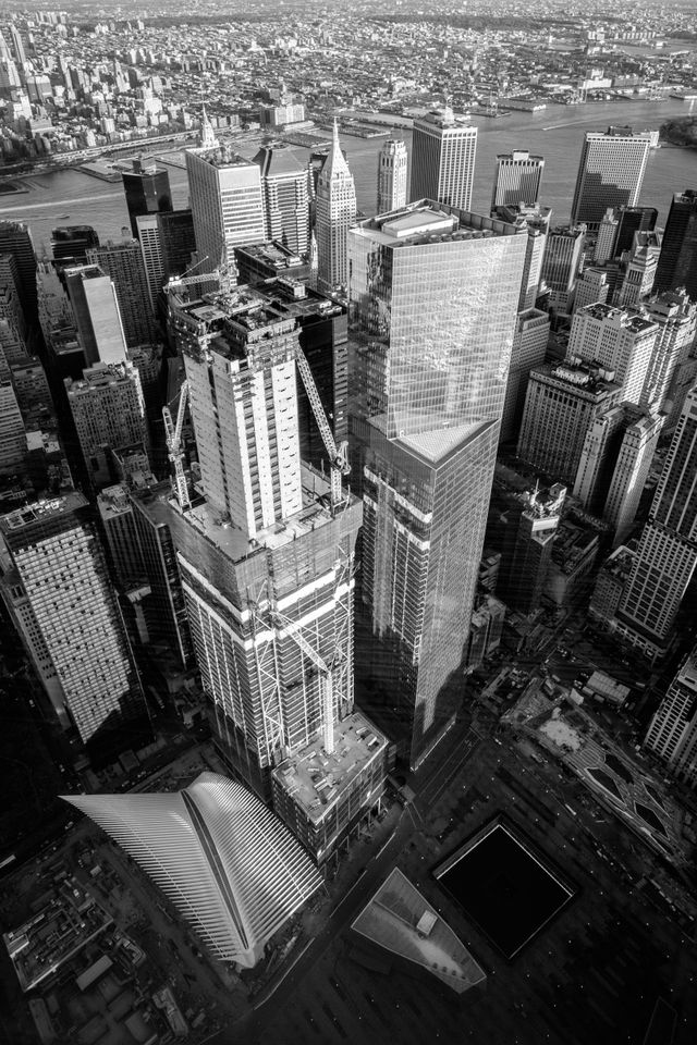 The World Trade Center Transportation Hub, Three World Trade Center, Four World Trade Center, and part of the 9/11 Memorial, from the World Trade Center Observatory.