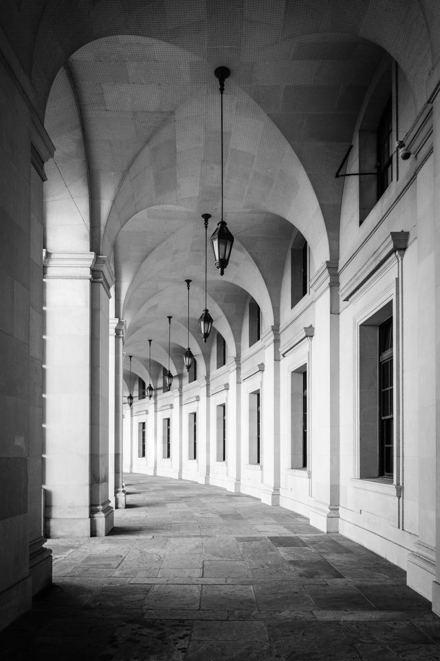 The vaulted ceiling and lamps on a curved pathway at Federal Triangle, Washington, DC.