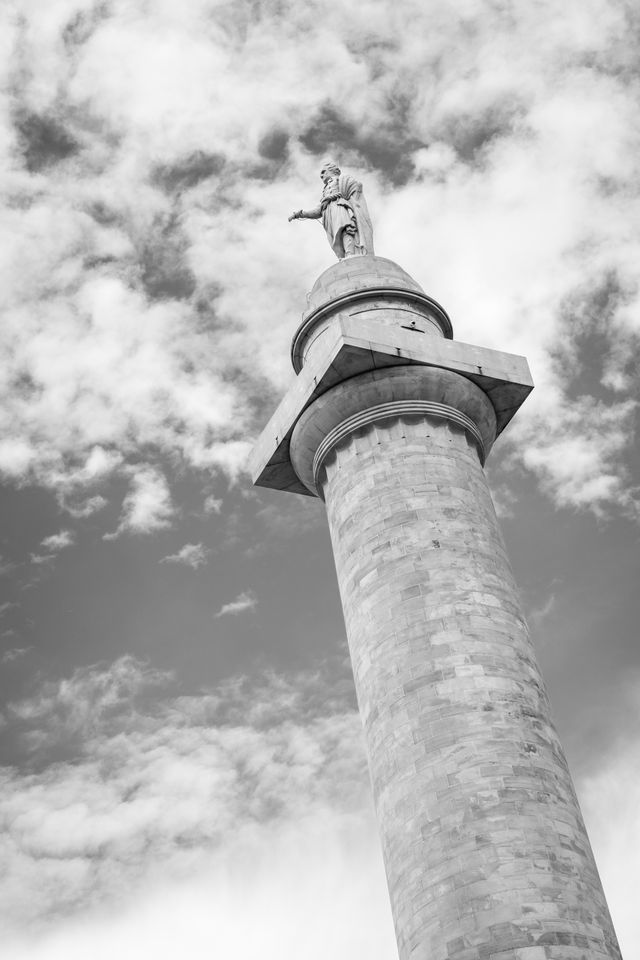 The statue of George Washington at the top of the original Washington Monument in Baltimore.