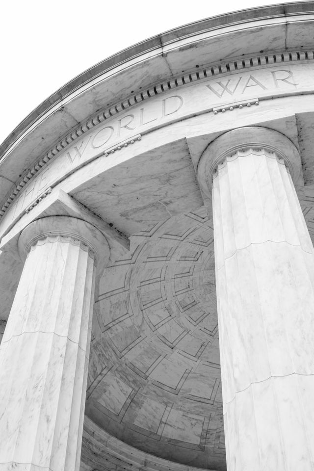 Two columns and a section of the roof of DC War Memorial, reading "the World War".