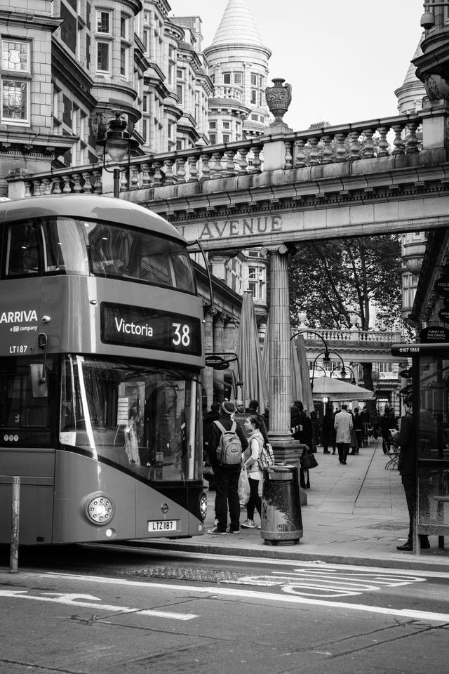 A double-decker bus stopped at Sicilian Avenue in Bloomsbury, London.