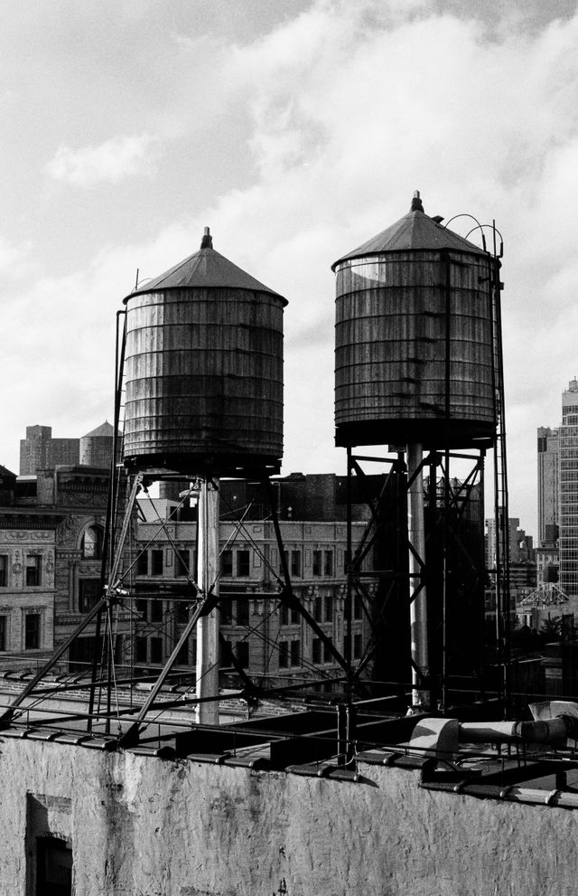 Water tanks on rooftops in New York City.