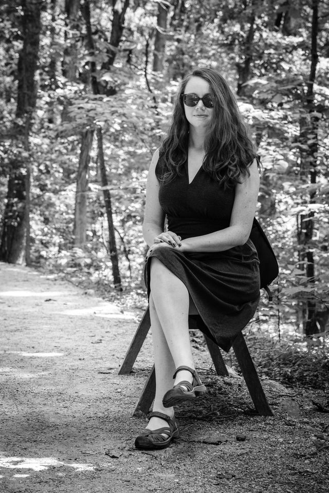 Kate, sitting on a bench in Monticello.