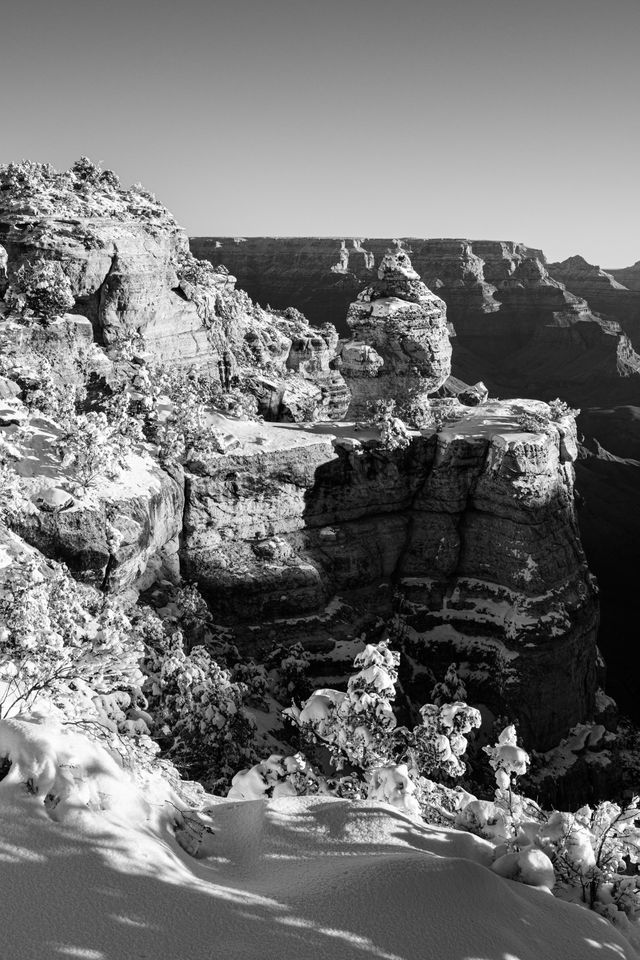 The Duck on a Rock on the snow-covered South Rim, in the morning.