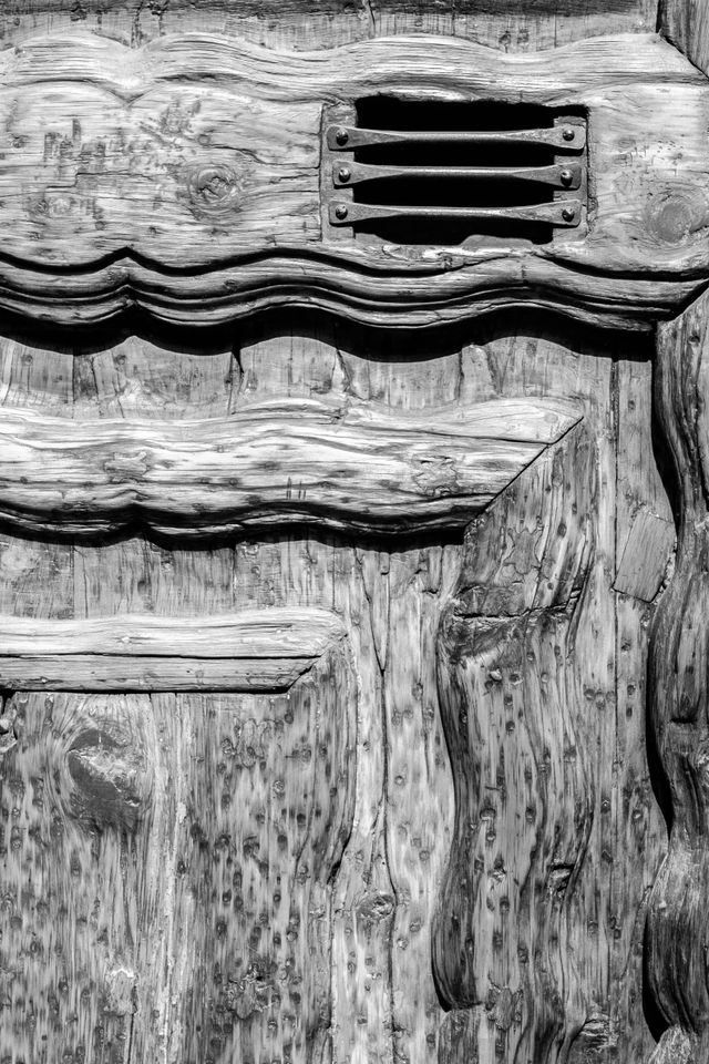 Detail of an old wooden door in the historic center of Mexico City.