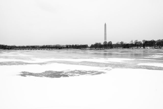 The Washington Monument, seen across the frozen Tidal Basin from the Jefferson Memorial.