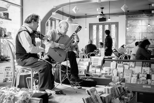 Two men playing live music at El Péndulo, in Condesa, Mexico City.