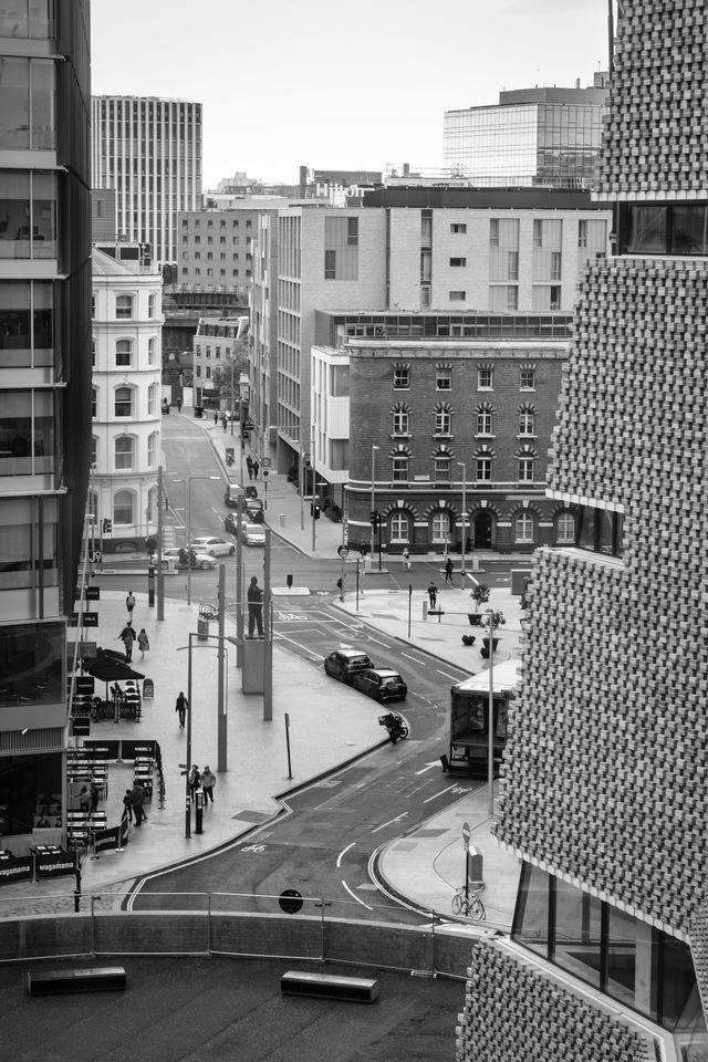 A curving street in Bankside, seen from Tate Modern.