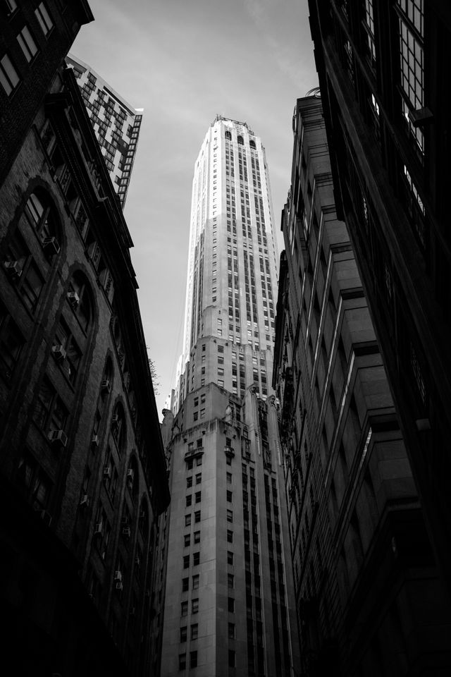 Looking up at 20 Exchange Place from William Street in the Financial District of New York.