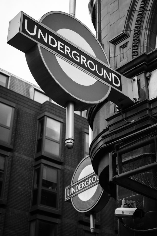 Underground signs in front of Covent Garden Station.