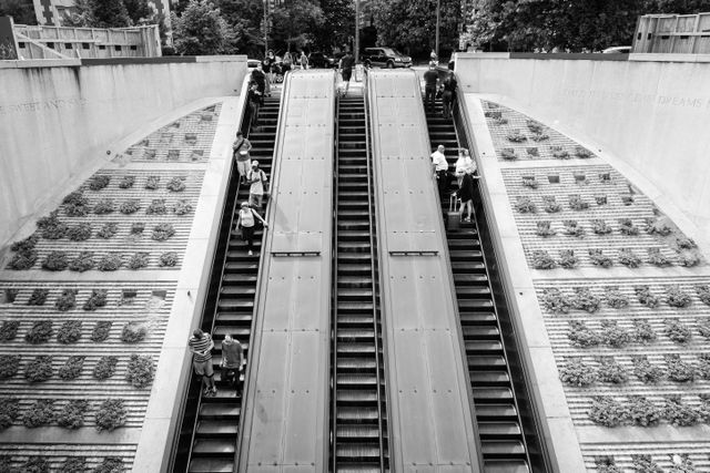 People on the escalators at the Q Street exit of Dupont Circle Metro Station in Washington, DC.