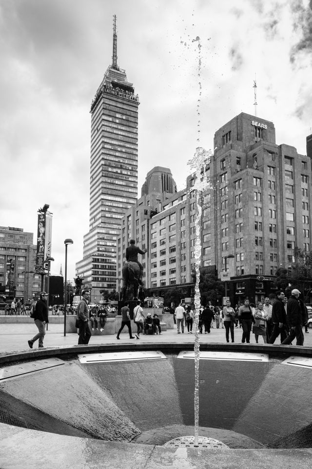 A fountain near the Alameda Central, with the Torre Latinoamericana in the background.