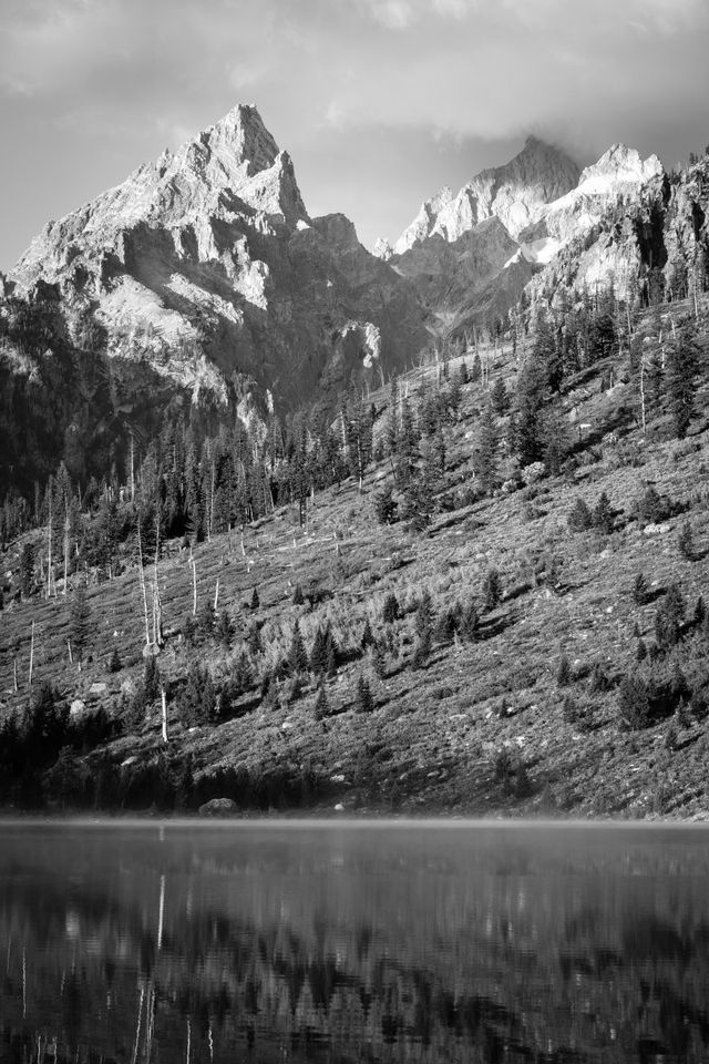 Teewinot Mountain & Grand Teton, seen from String Lake. The Grand's summit is shrouded in clouds.