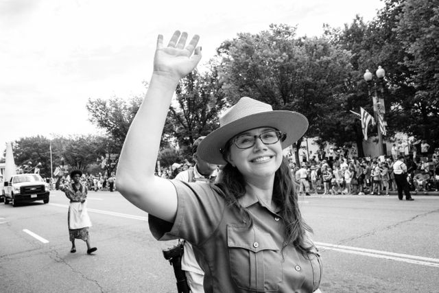 Kate, waving at people watching the Independence Day Parade in Washington, DC.