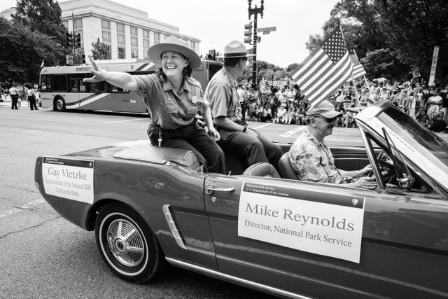 Gay Vietzke, Superintendent of the National Mall and Memorial Parks, and Mike Reynolds, Director of the National Park Service, riding on a Mustang at the Independence Day Parade in Washington, DC.