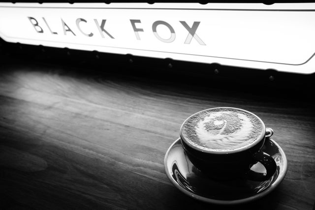 A cappuccino on the bar at the Black Fox coffee shop in New York City.