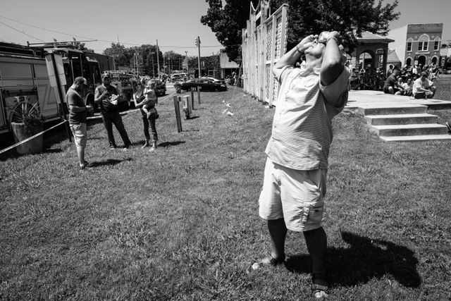 A man looking at the solar eclipse at the L&N Depot Museum in Etowah, Tennessee.