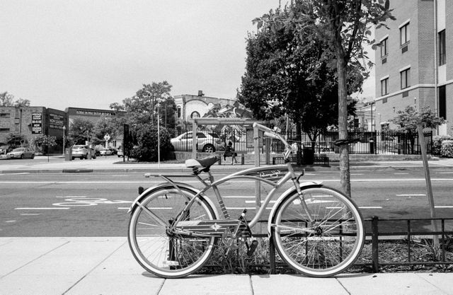 A bike chained on the street at 7th & S Street.