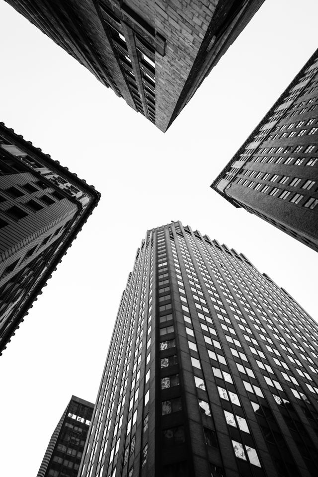 Looking up at buildings in New York's Financial District.