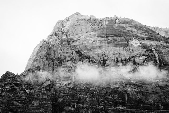 The Great White Throne, seen from the Kayenta Trail, with some fog clinging to its wall.