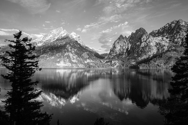 Grand Teton and Storm Point, reflected off the waters of Jenny Lake.