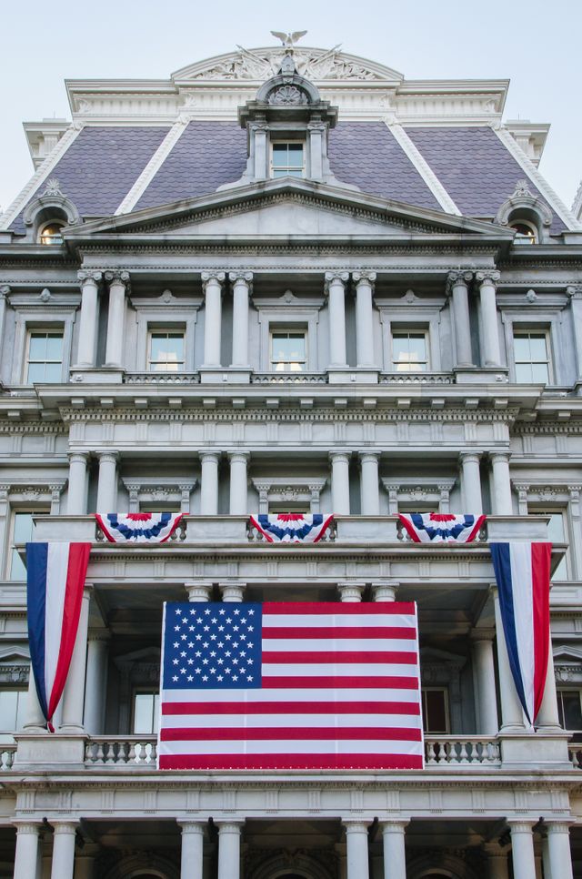 The Old Executive Office Building, covered in flags and buntings.