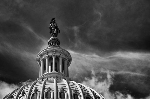 The Statue of Freedom at the top of the United States Capitol.