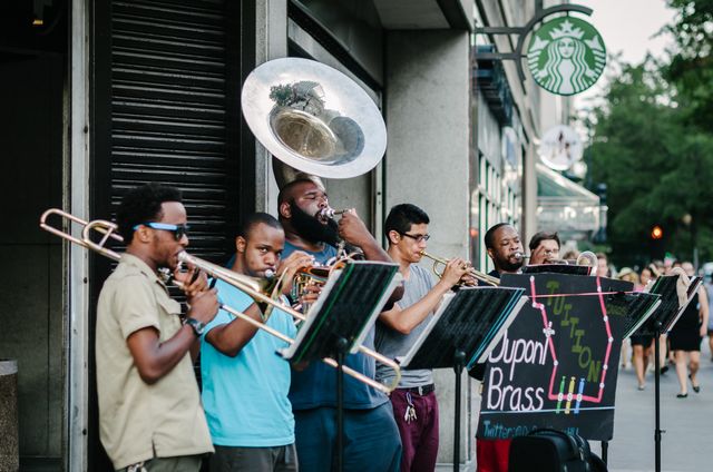 Dupont Brass, playing music in front of the Farragut North Metro Station in Washington, DC.