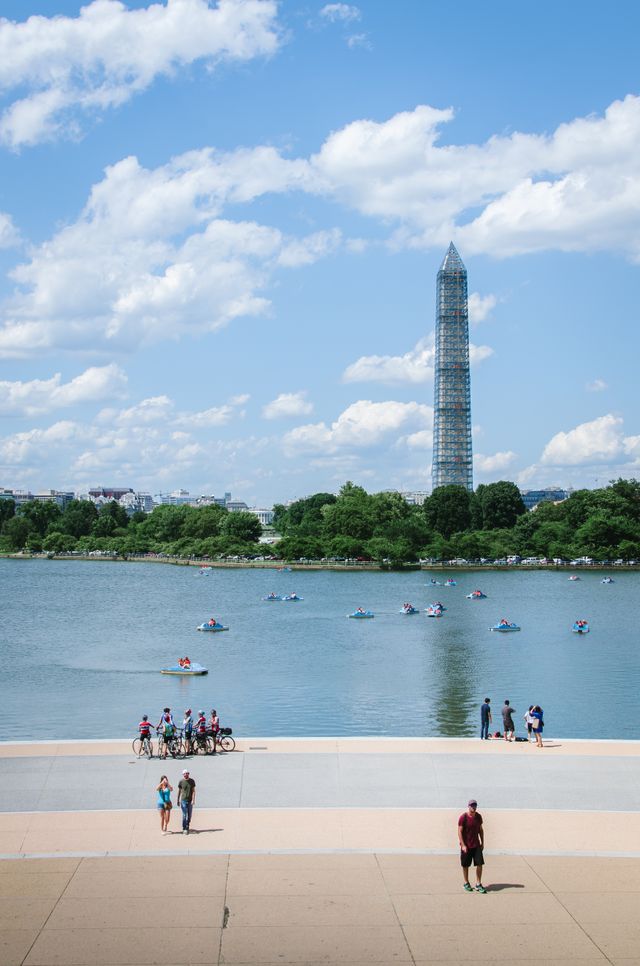 The Washington Memorial covered in scaffolding, seen from the Jefferson Memorial, across the Tidal Basin.