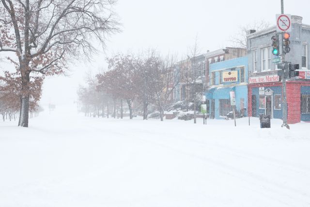 The corner of Pennsylvania Avenue and 15th Street SE, completely covered in snow.