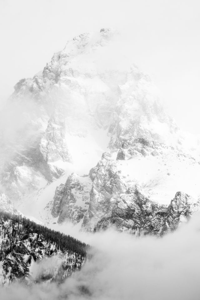 Grand Teton, shrouded in clouds.