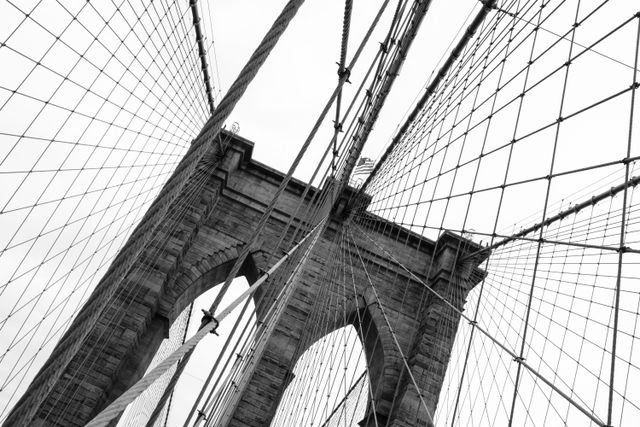 The United States flag at the top of one of the towers of the Brooklyn Bridge.